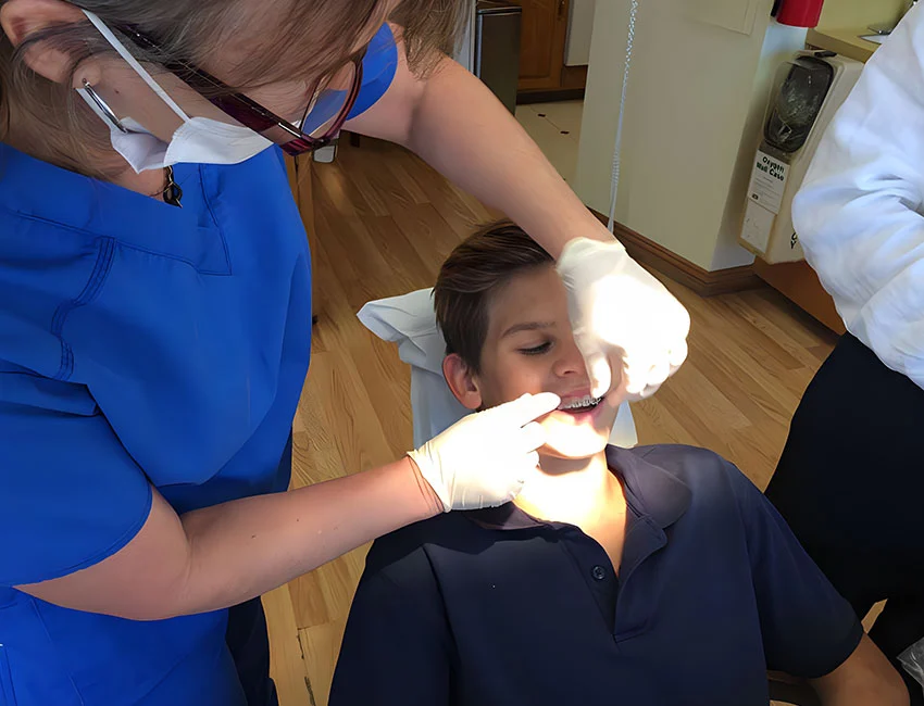 Adjusting Braces at Orthodontic office in Woodland Hills, CA